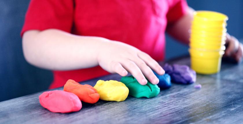 Child playing with playdough